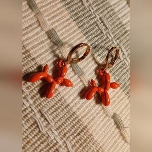 Orange balloon dog earrings